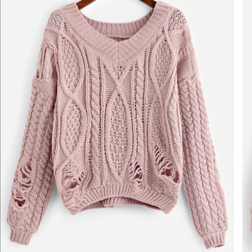 Pink sweater size medium. Like new